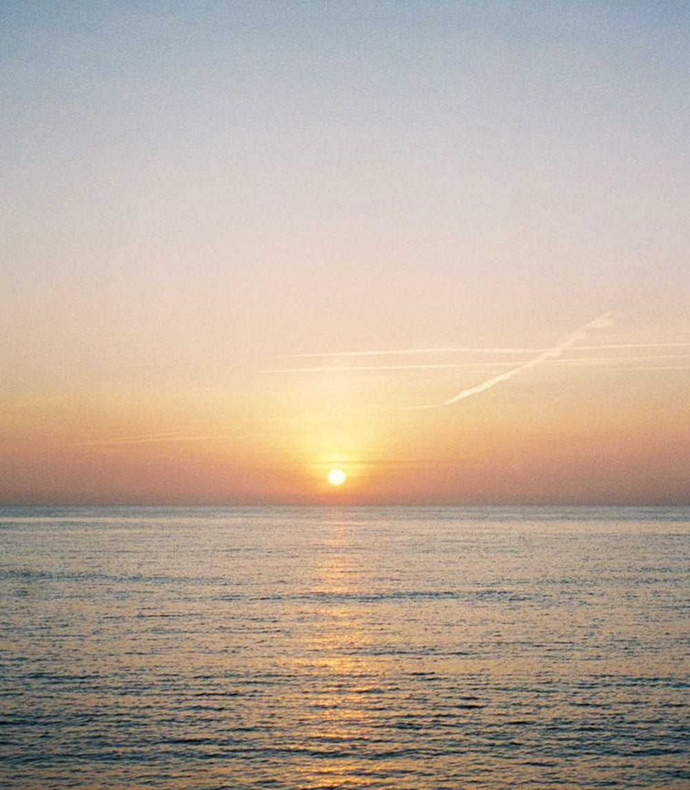 Image of a sunrise over water