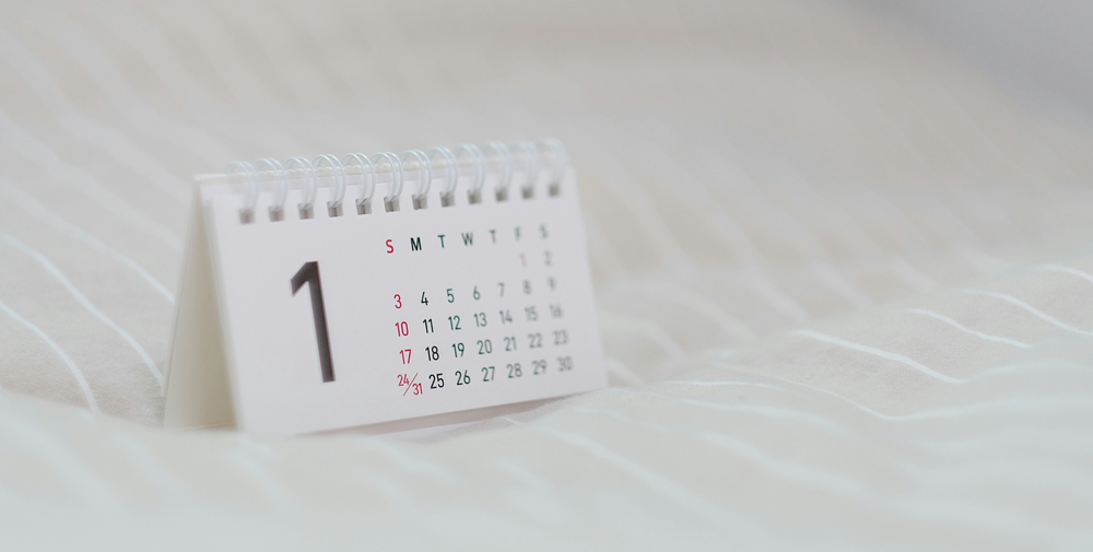Small desk calendar displaying the first day of January, symbolizing a fresh start and new resolutions.