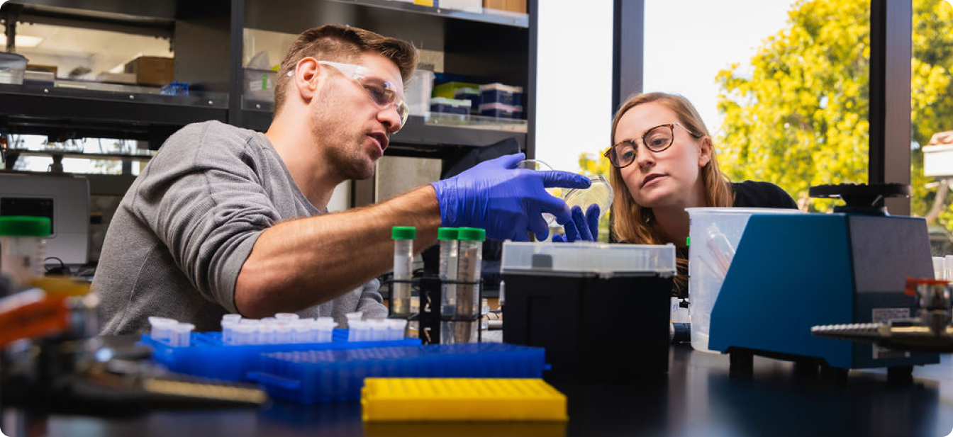 ZBiotics' scientists in a lab bioengineering Pre-Alcohol